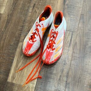 Adidas Vibrant Red and Orange Cleats